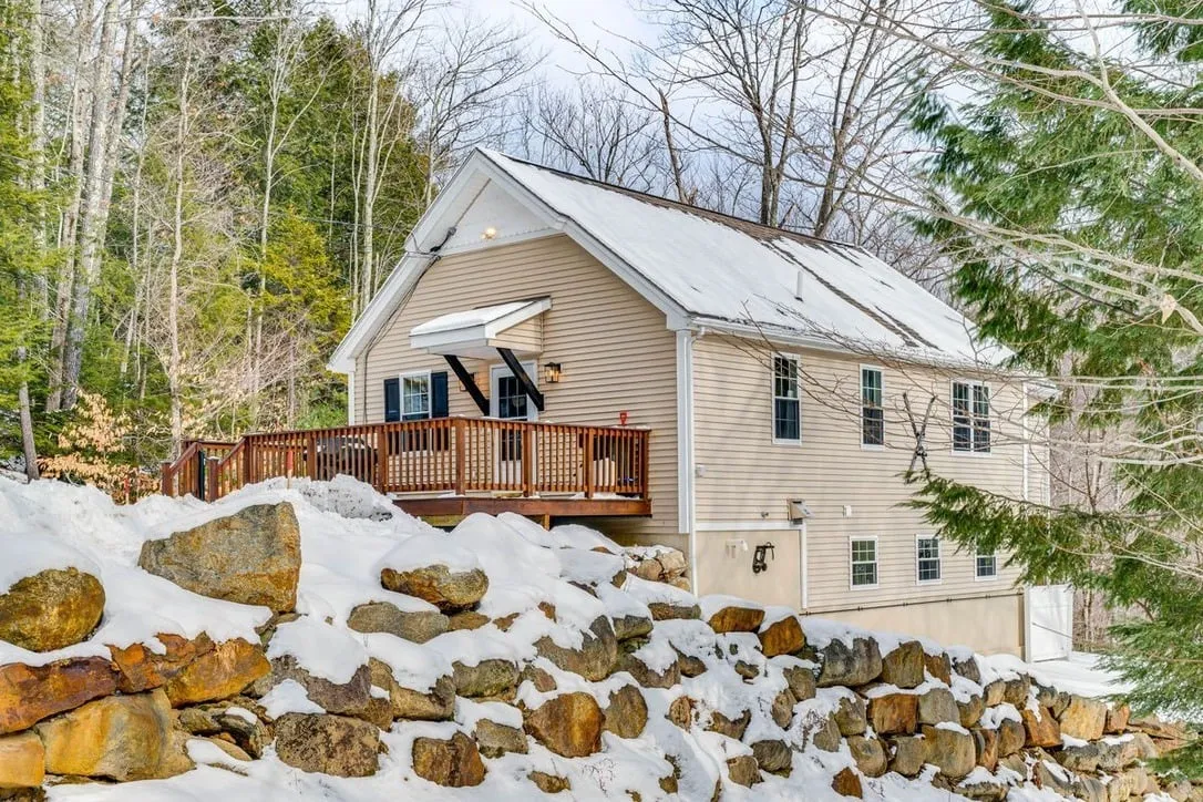 Welcoming New Hampshire home surrounded by snow